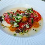 Heirloom Tomatoes on silken tofu ($15)